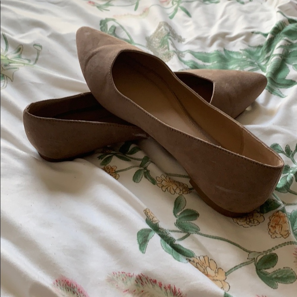 Tan suede flats, pointy toe.